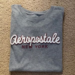Women’s grey Aeropostale tshirt, with maroon red lettering.